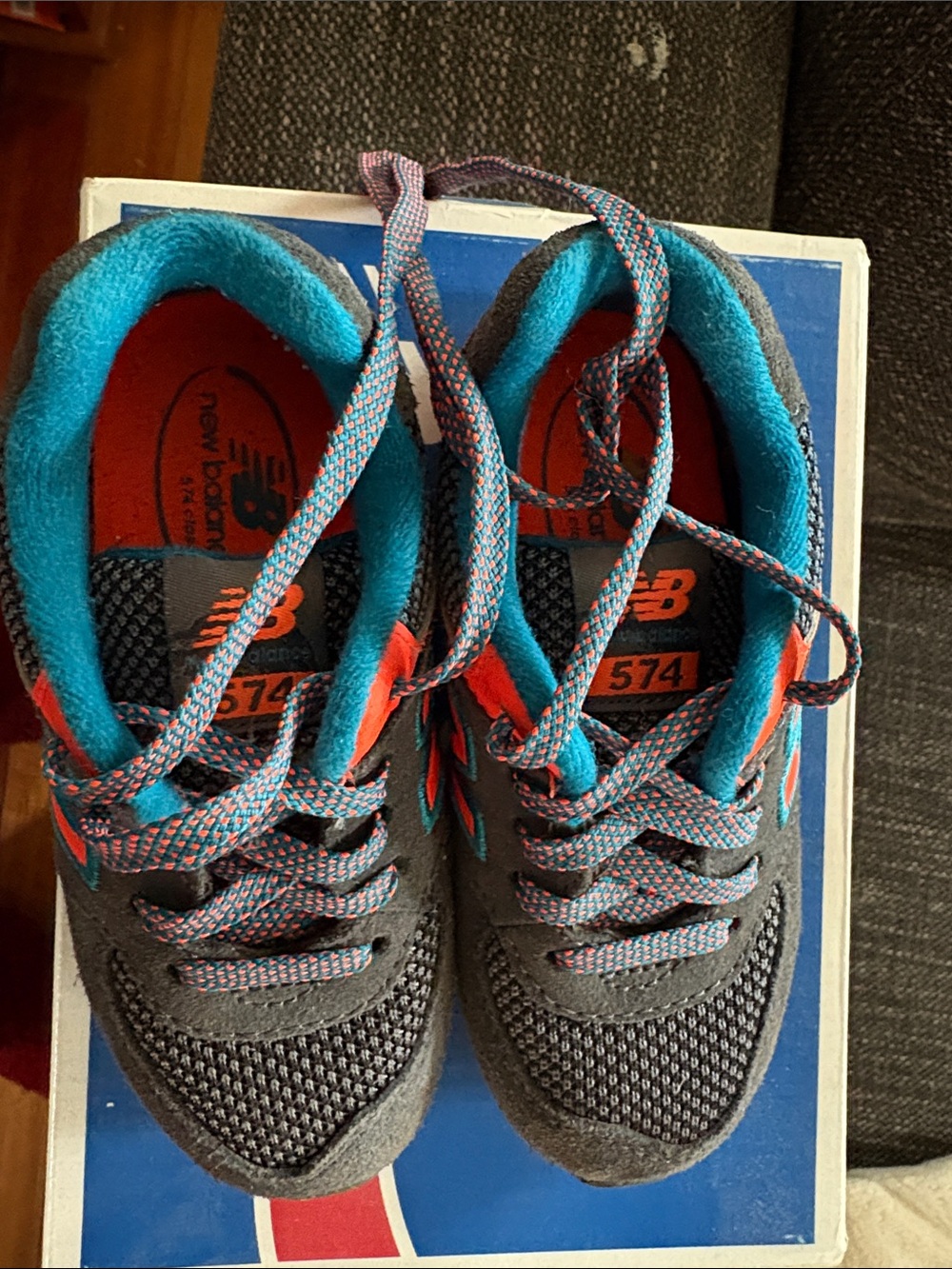 New Balance unisex toddler Gray Sneakers with Teal and Orange Accents